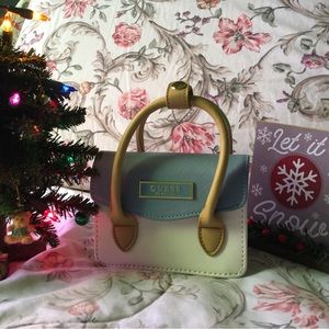 Guess lipstick purse